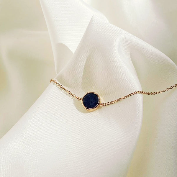 bracelet plaqué or pierre bleue forme ronde sodalite